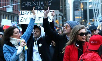 Gigi and Bella Hadid Spotted Joining Anti-Trump Rally Against Immigration Ban