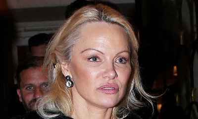 Pamela Anderson Sparks Plastic Surgery Rumors as She's Barely Recognizable in Paris
