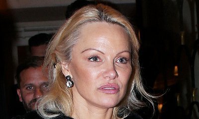 pamela anderson sparks plastic surgery rumors as she s barely