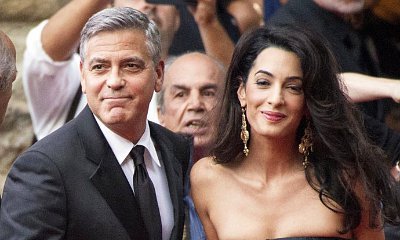 Amal Shows Off Baby Bump in Form-Fitting Gown as She Supports George Clooney at Cesar Awards