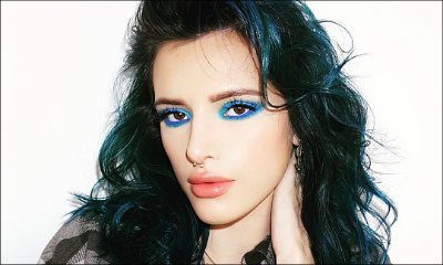 Bella Thorne Flashes Flat Tummy in Lacy Crop Top When Caught on Bike Date With Mystery Man