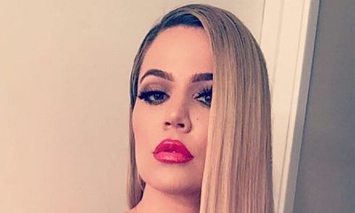 Khloe Kardashian Flashes Her Boobs While Posing in Lacy Lingerie