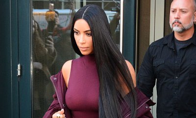 Kim Kardashian Bares Nipples in Sheer Top as Critics Rip Kanye West's Yeezy Fashion Show