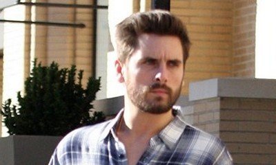 Scott Disick Pictured With Another Women Sitting in His Lap