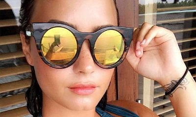 Ready for Summer! Demi Lovato Flaunts Major Cleavage in Plunging Swimsuit