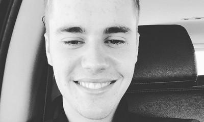 Justin Bieber Shares His Old Mugshot, Reflects on His Troubled Past