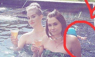Here's Kelly Osbourne's Hilarious Reaction to Her 'Baby Arm' Epic Photo Fail
