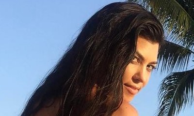 Juicy! Kourtney Kardashian Flaunts Butt in Thong One-Piece