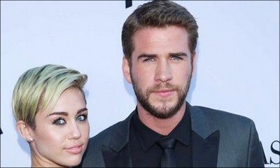 Miley Cyrus Flaunts Toned Abs While Hiking With Fiance Liam Hemsworth