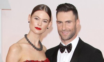 Adam Levine Flaunts 'True Love' Tattoo as He Grabs Behati Prinsloo's Booty Adam Levine Flaunts 'True Love' Tattoo as He Grabs Behati Prinsloo's Booty