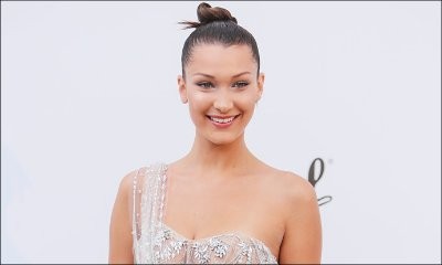 Bella Hadid Suffers Another Wardrobe Malfunction in High-Slit Dress at amfAR Gala