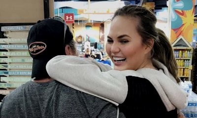 Chrissy Teigen Gets Matching Henna Tattoos With Random Man to Get Back at John Legend