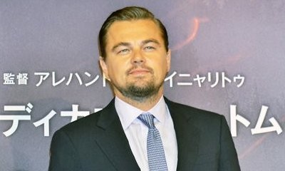 Leonardo DiCaprio Gets Flirty With Pretty Brunette During Guys' Night Out