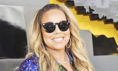 Mariah Carey Flashes Her Nipple and Crotch in Tight Leather Mini Dress
