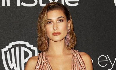 Hailey Baldwin Flaunts Pert Derriere in Tiny Camo Bikini