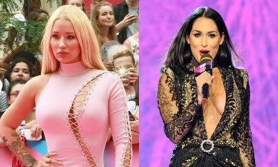 Iggy Azalea Goes Commando in Racy Lace-Up Dress at MMVAs, Nikki Bella Rocks Plunging Sheer Gown