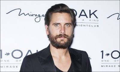Scott Disick Hangs Out With Topless Woman in London
