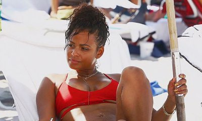 Christina Milian Flashes Major Underboob in Daring Red Bikini