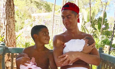 Pic: Cristiano Ronaldo and His Son Cuddling Newborn Twins Is Just Too Cute