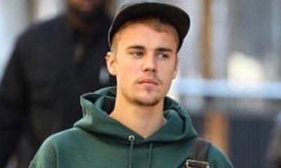Justin Bieber Is Mobbed by Fans When Stepping Out of Nando's in Sydney