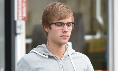 Justin Bieber Pulled Over by Cop for Using Phone While Driving
