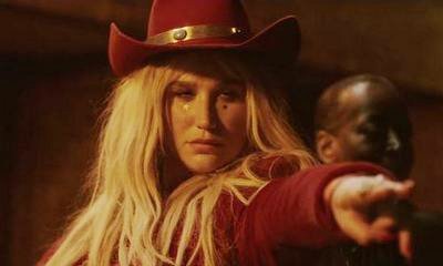 Kesha Is Total Bada** in 'Woman' Music Video