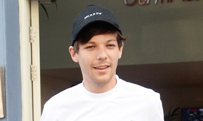 Louis Tomlinson Shuts Down One Direction Feud Rumors: 'We're All Such Good Mates'