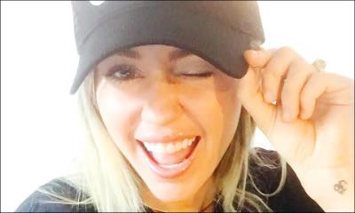 Miley Cyrus Goes Shopping in Malibu in Tiny Bikini