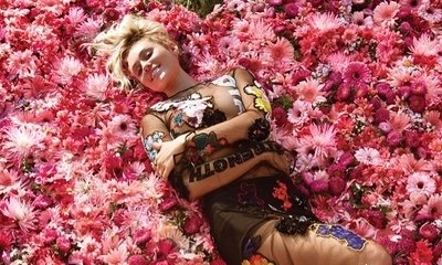 Miley Cyrus Tones Down Her Look Because She Felt 'Sexualized', Defends Her Wild Past