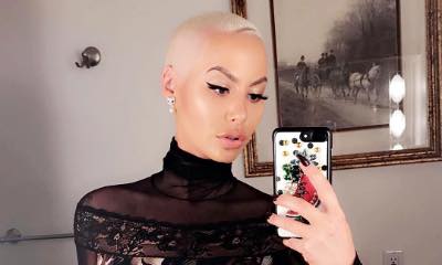 Amber Rose Considering a Breast Reduction: 'My Boobs Are Stupid Heavy'