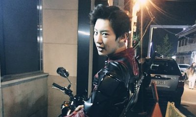 EXO's Chanyeol Dresses Up as Deadpool and Roams the Streets in Throwback Photos