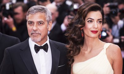 George and Amal Clooney Share Sweet Kiss During Romantic Dinner in Italy