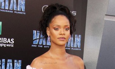 Rihanna Hides Under Umbrella During Date Night With Hassan Jameel in London