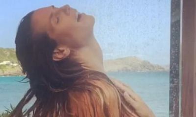 Watch: Topless Heidi Klum Takes Outdoor Shower in St. Barts