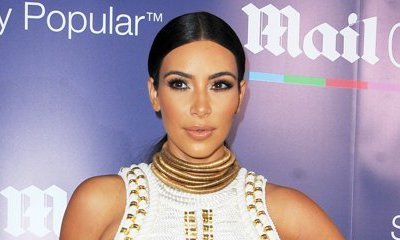 Braless Kim Kardashian Flaunts Her Nipple in Sheer Top