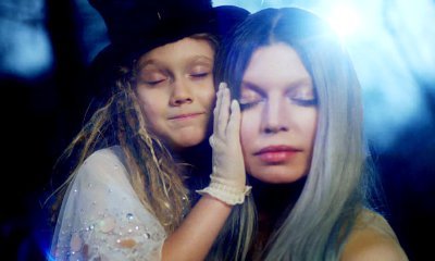 Follow Fergie's Journey to Find Salvation in Powerful 'A Little Work' Video