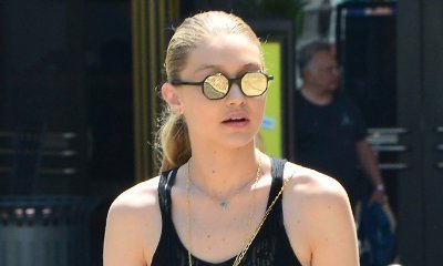 Gigi Hadid Loses a High Heel on Anna Sui's Runway, Handles It Flawlessly