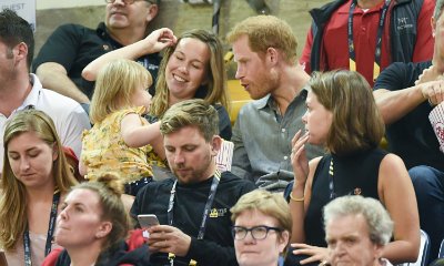 Prince Harry Pens Heartwarming Letter for Athlete's Wife, Makes Faces at Popcorn-Stealing Toddler