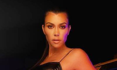 Kourtney Kardashian Goes Commando in Sexy Lace-Up Dress