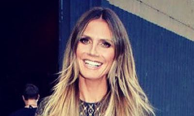 Heidi Klum Sunbathes Naked, Shows Bare Butt in Racy Photo