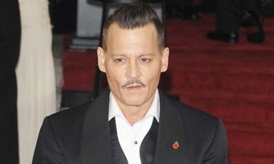 Johnny Depp Looks Disheveled and Drunk on Red Carpet