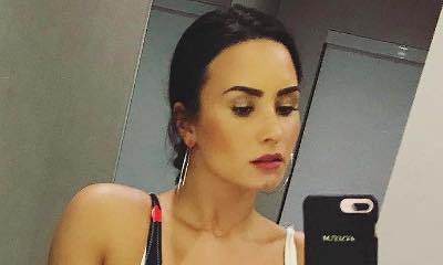 Demi Lovato Flaunts Major Cleavage in Plunging Bathing Suit - See the Sexy Pic