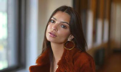 Emily Ratajkowski Goes Provocative in Topless Bed Picture
