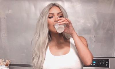 Kim Kardashian Flaunts Flat Tummy in a Tiny Crop Top and Thong
