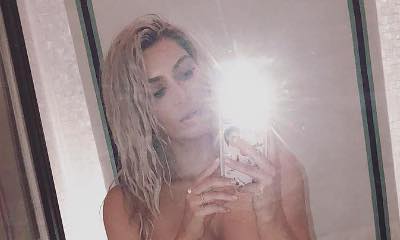 Kim Kardashian Poses Topless While Wearing Crystal Panties