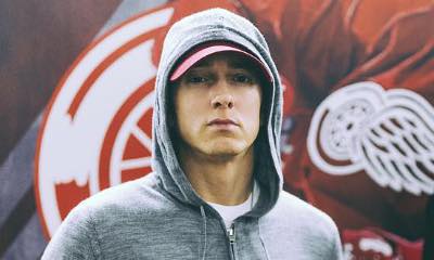 No Longer Single? Eminem Kisses a Mystery Woman in Leaked Video