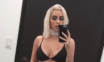 Kim Kardashian Posts Barely-There Bikini Pic After Revealing She Has a 24-Inch Waist