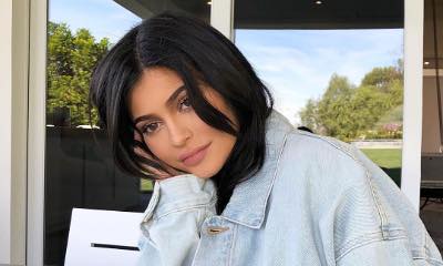 Kylie Jenner Covers Up in Baggy Tracksuit While Making Her Kylie Jenner Covers Up in Baggy Tracksuit While Making Her