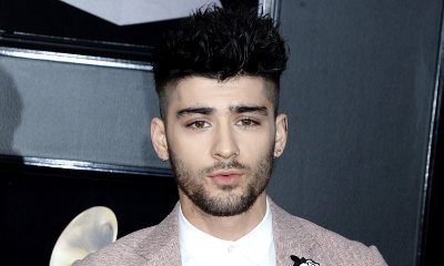 Zayn Malik Unveils New Huge Rose Tattoo Following Gigi Hadid Split