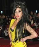 Amy Winehouse's Incarcerated Husband Begs Her Not to Leave Him